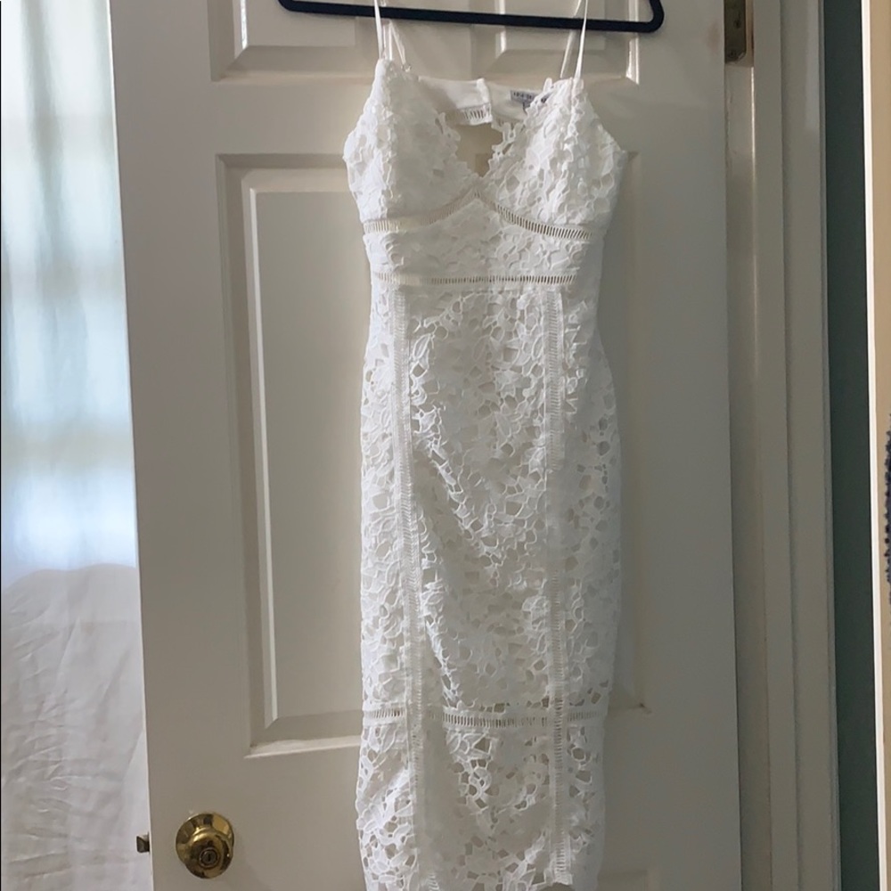 White crotchet knee length dress